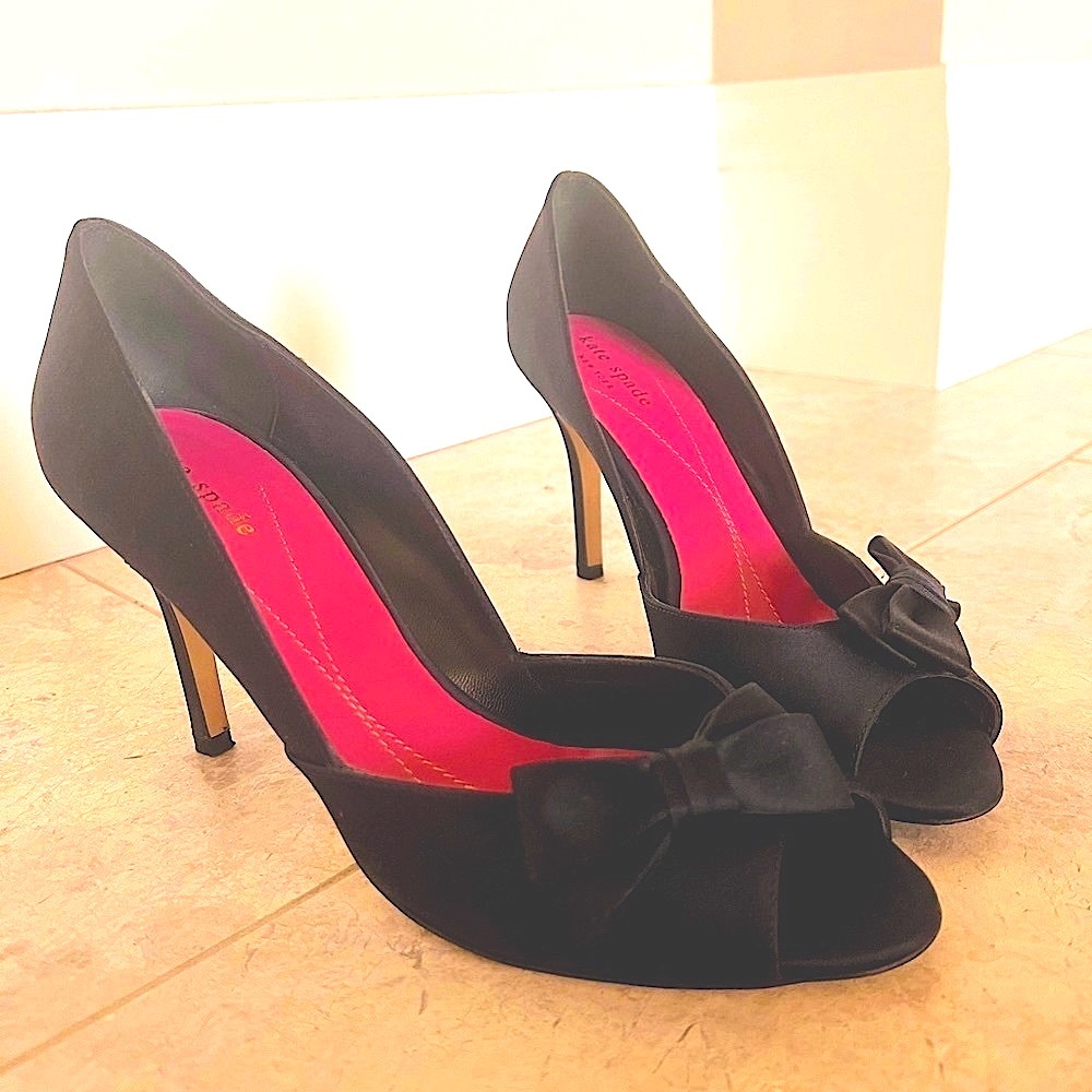 Kate Spade black satin chic heel. Makes the calf and legs look stunning.